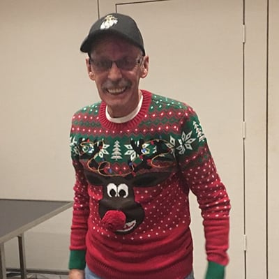 employee-in-ugly-christmas-sweater